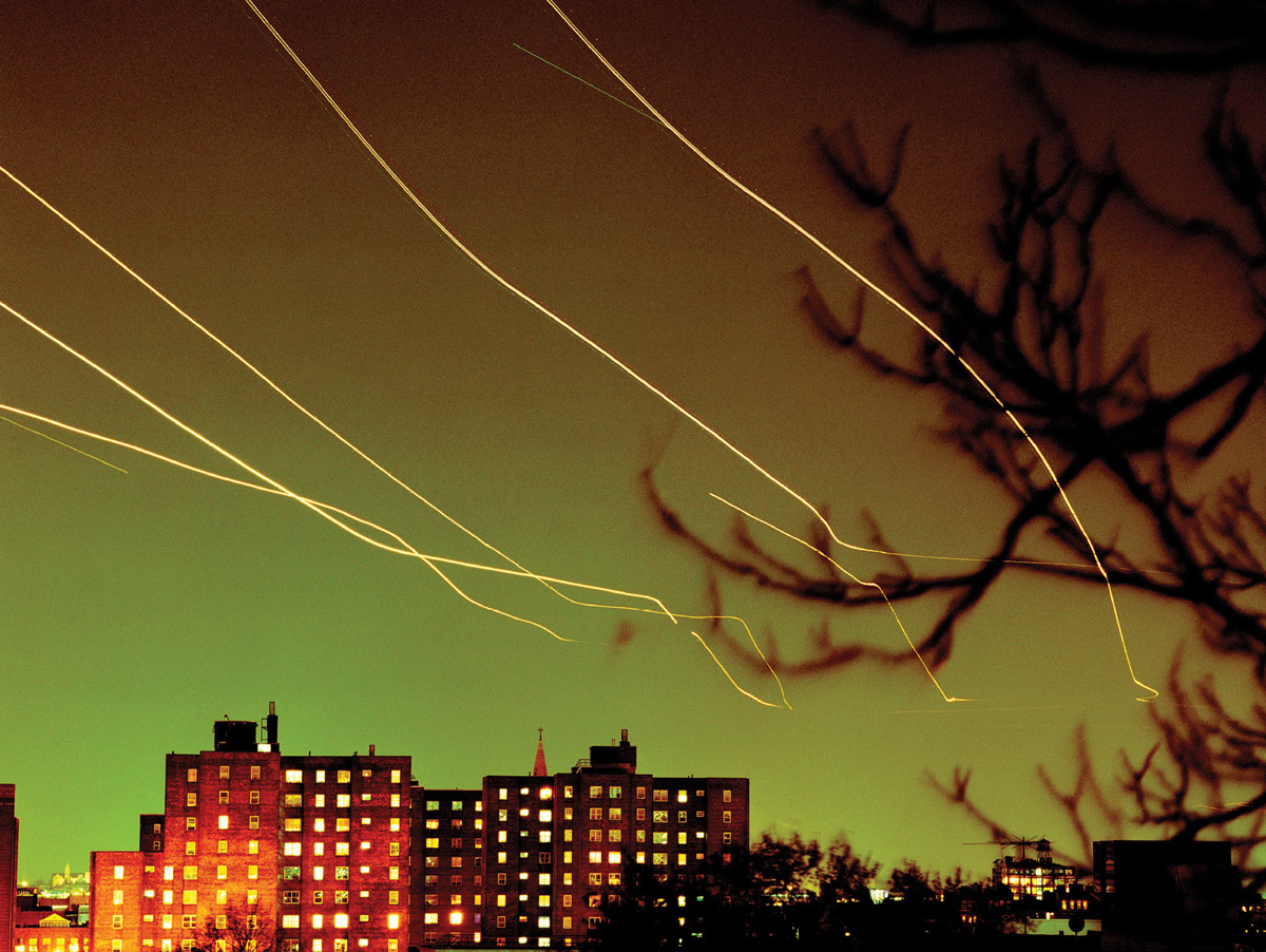 Long-exposure photograph from 2001 of flight paths by Hans Wilschut, entitled JFK.
