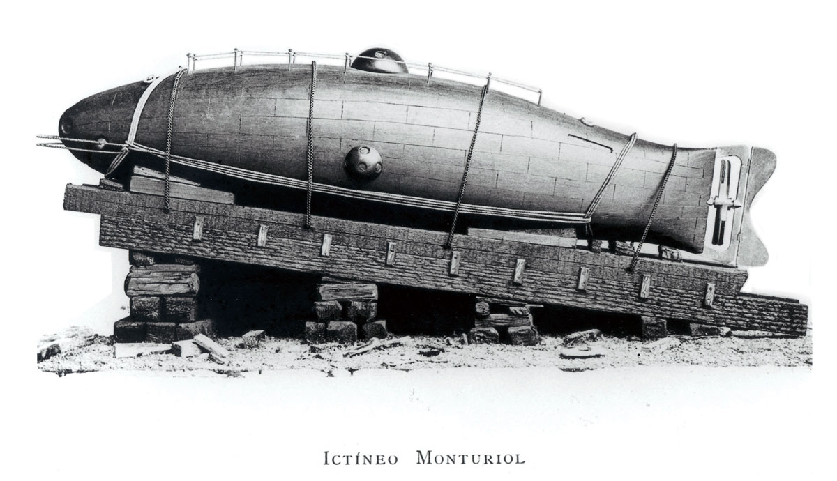 A photograph of a submarine strapped to a ramp, captioned 
