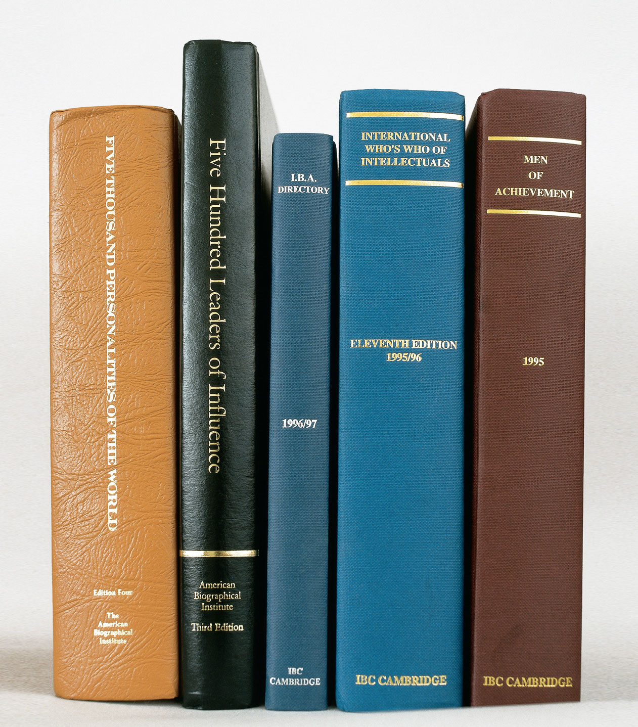 A photograph of five books, including “Men of achievement” and ”Five Hundered Leaders of Influence.”