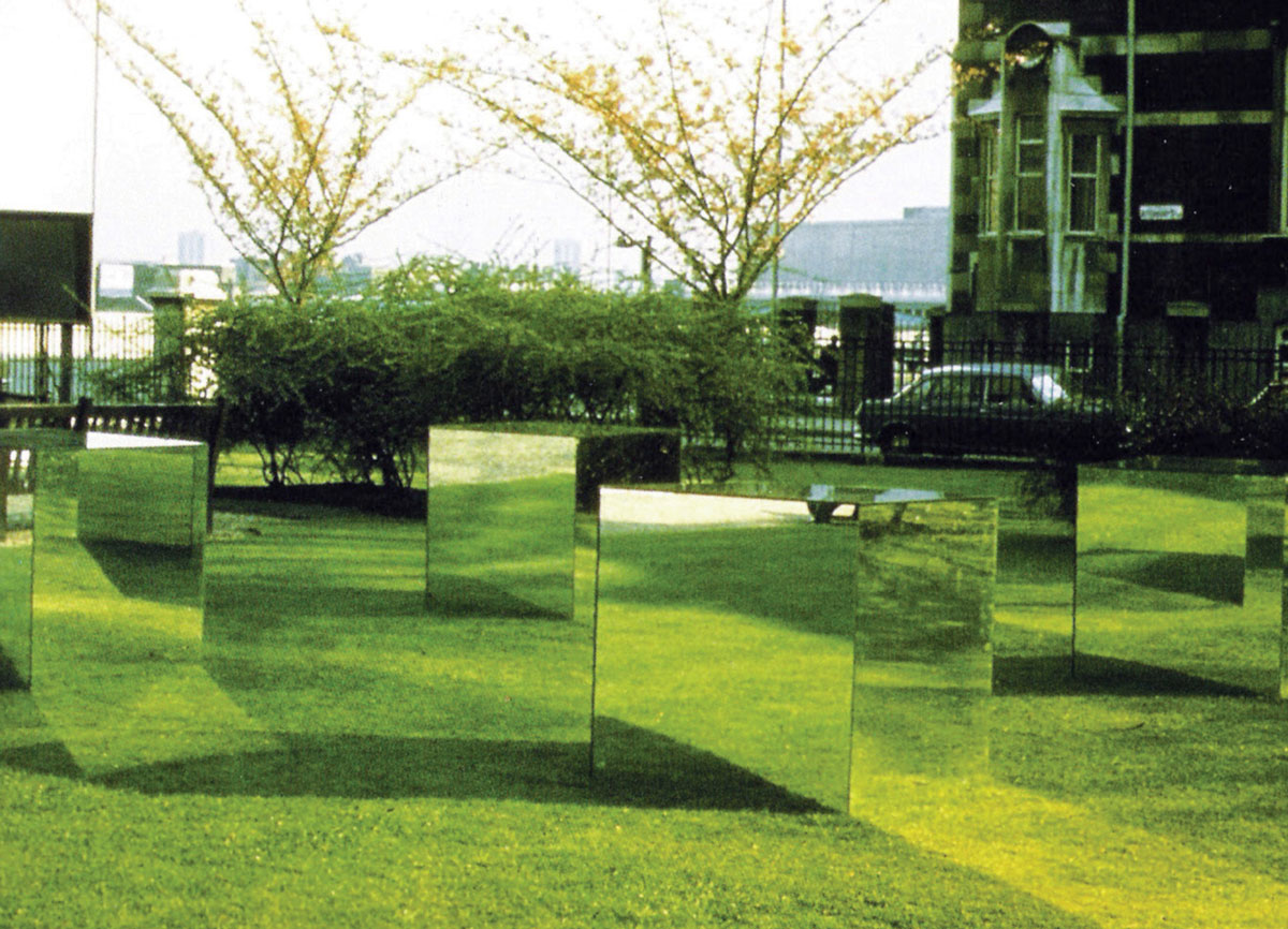 Artist Robert Morris’s 1965 installation titled “Untitled (Mirrored Cubes).”