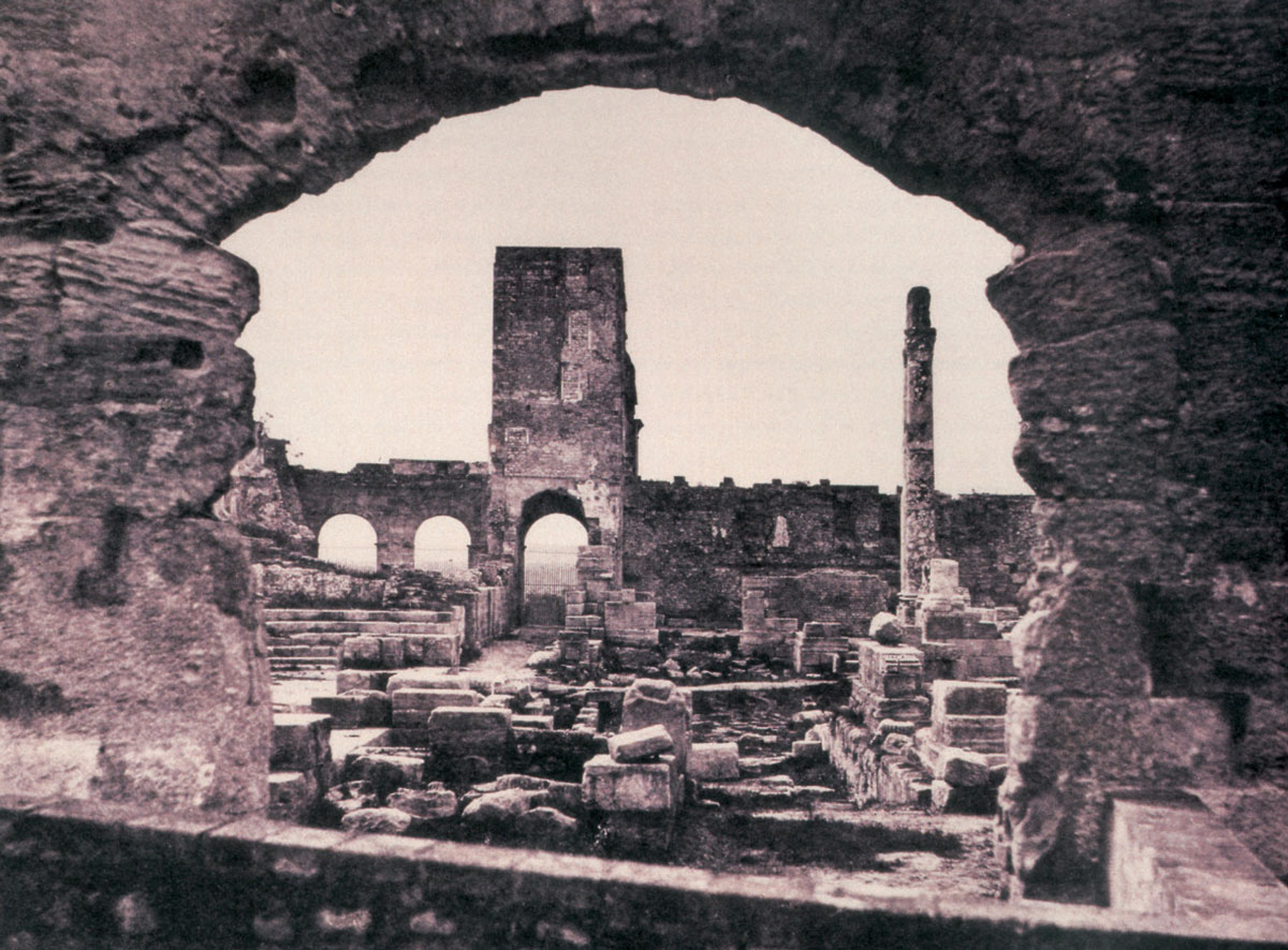 A detail of Édouard Denis Baldus’s eighteen fifty-one photograph titled “Mission héliographique of 1851, Roman Theater at Arles,” depicting the ruin.