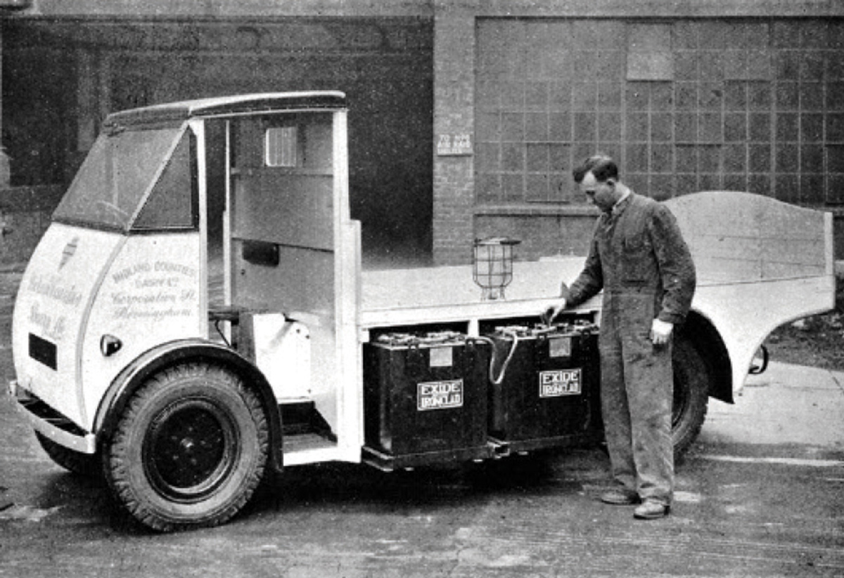 A photograph of a Midland milk delivery van, UK, nineteen thirties.