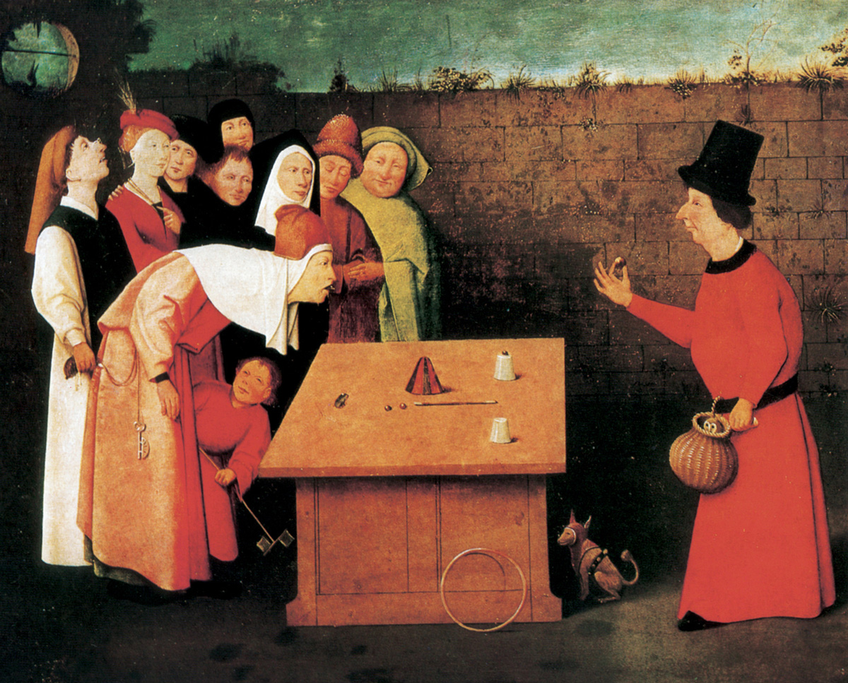 A painting by Hieronymous Bosch titled “The Conjurer,” circa fourteen seventy five fourteen seventy eight. Art historians disagree as to whether this is a faithful copy of a lost Bosch original, or by Bosch himself. Note the pickpocket stealing the purse of the man enthralled by the Cups and Balls game. If turned counter-clockwise 90 degrees, the arrangement of the props on the table mirrors the surprised expression of the dupe.
