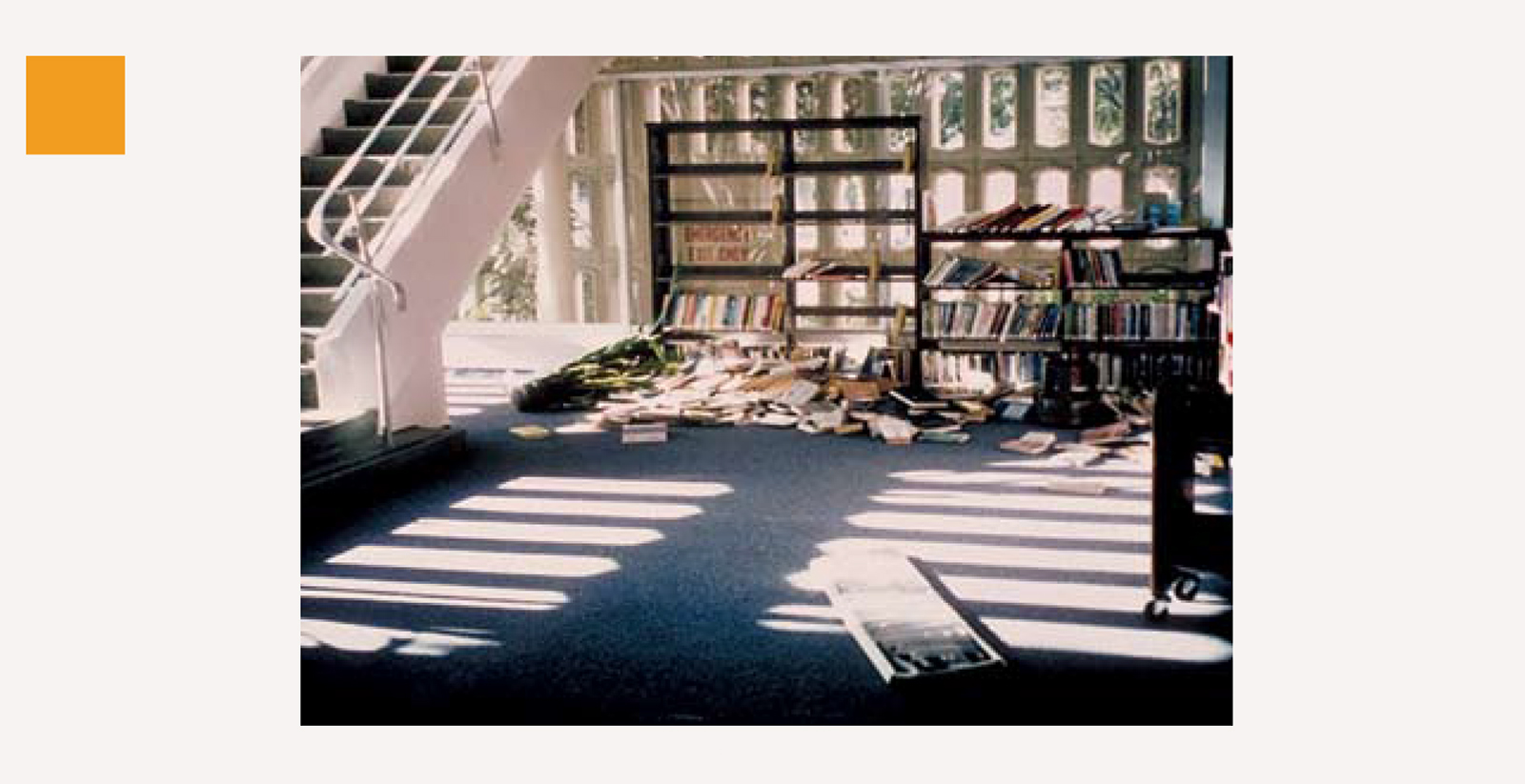 A photograph of toppled books at the Santa Monica Public Library in the aftermath of an earthquake on 17 January 1994.