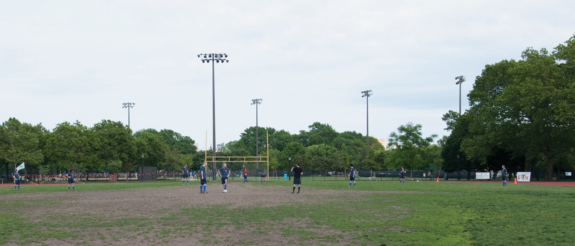 A photograph of Cabinet Soccer Club on the field waiting for their opponents to arrive.