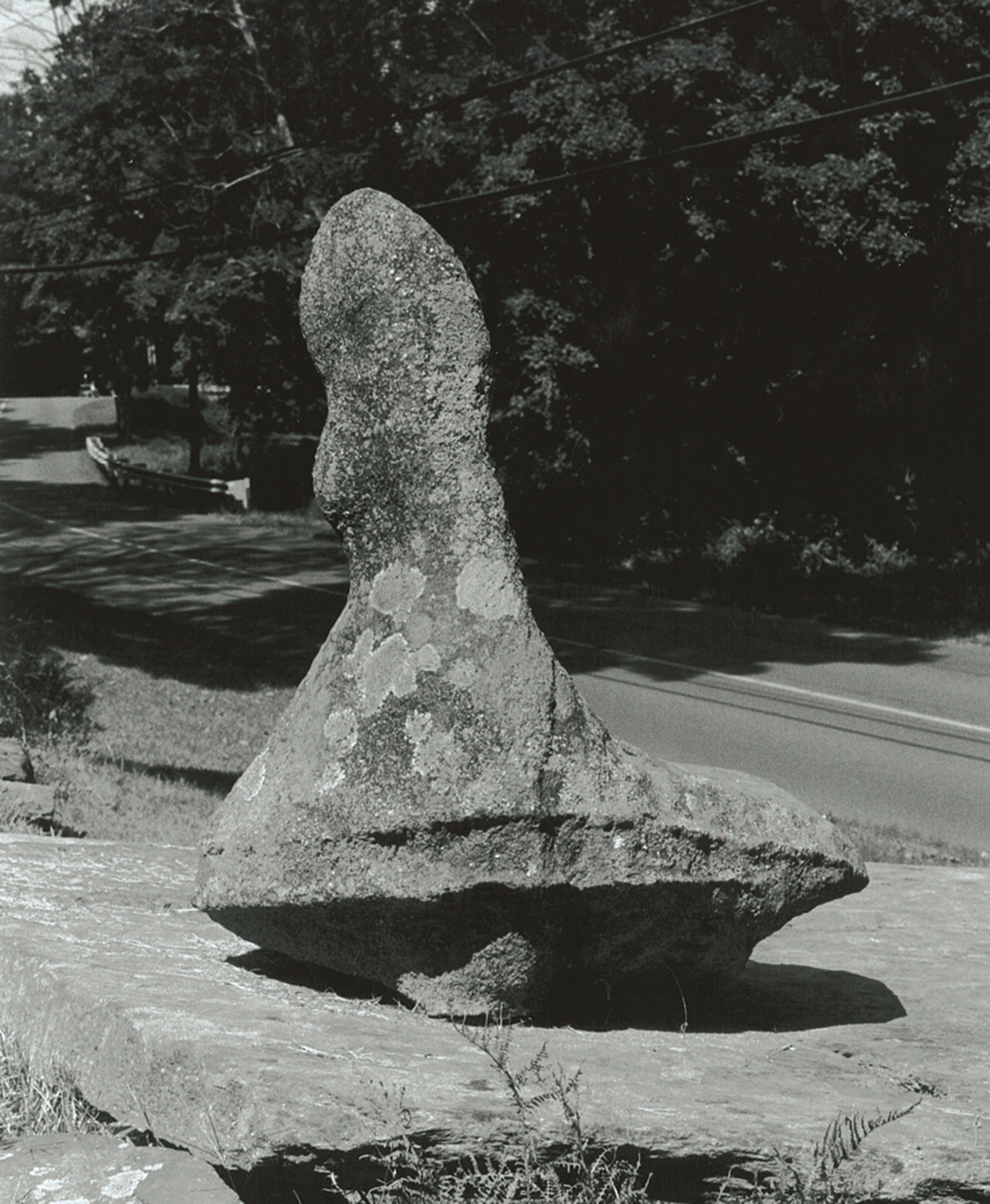A photograph of an anthropomorphic erratic stone in Newtown, Connecticut, which measures 38 inches high.