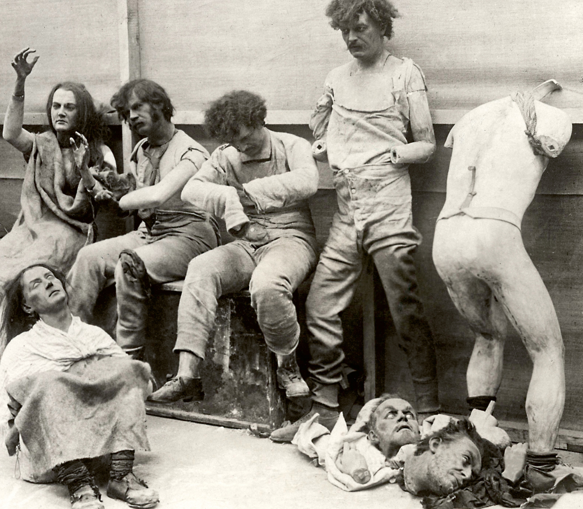 A nineteen twenty-five photograph of damaged wax models after the fire at Madame Tussaud’s.