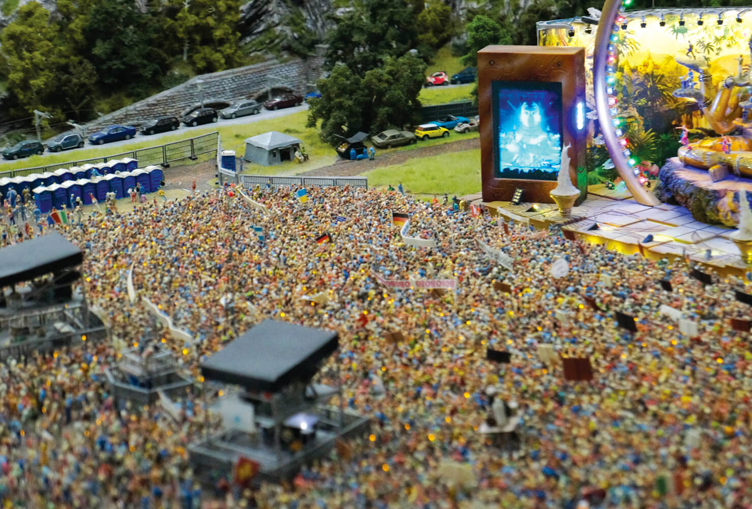 A photograph of a miniature crowd enjoying a concert at the Miniatur Wunderland.