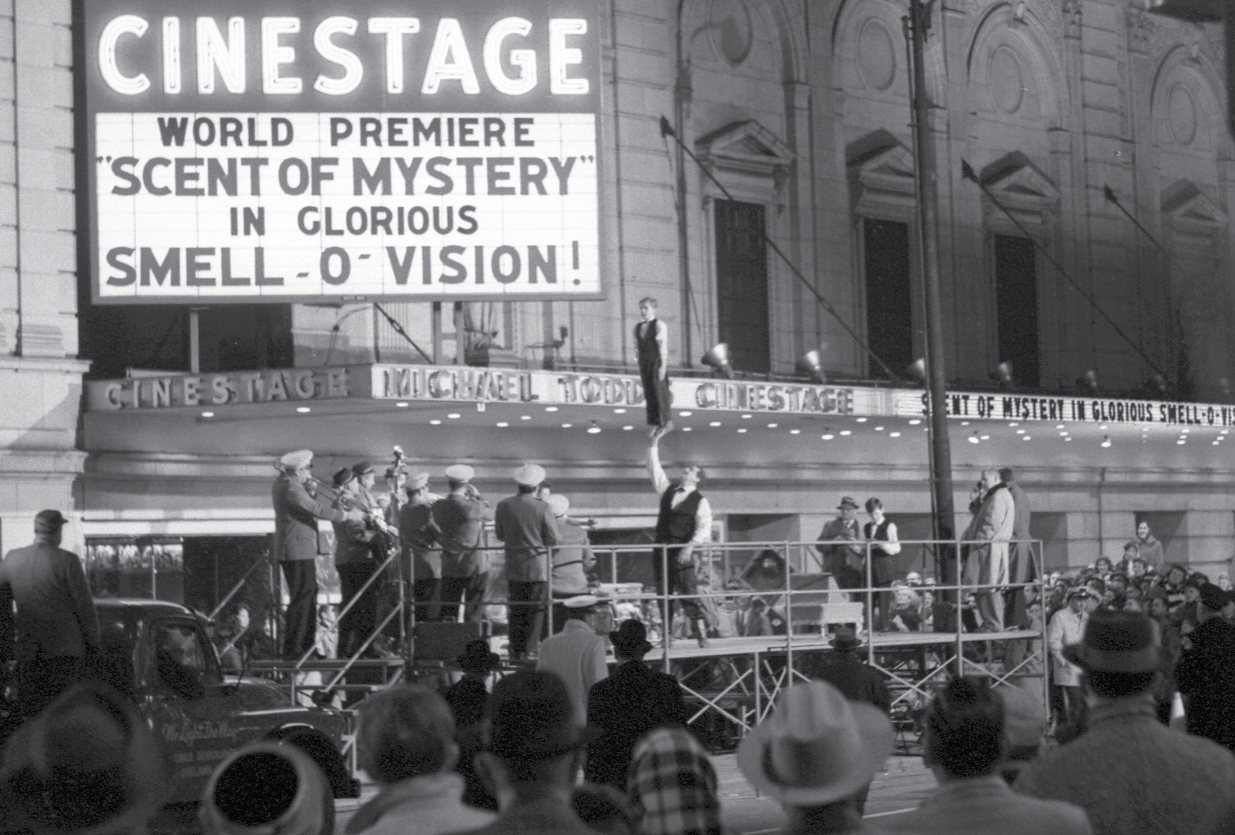 A photograph of Chicago's Cinestage marquee on the January sixth nineteen sixty debut of Smell-o-Vision.