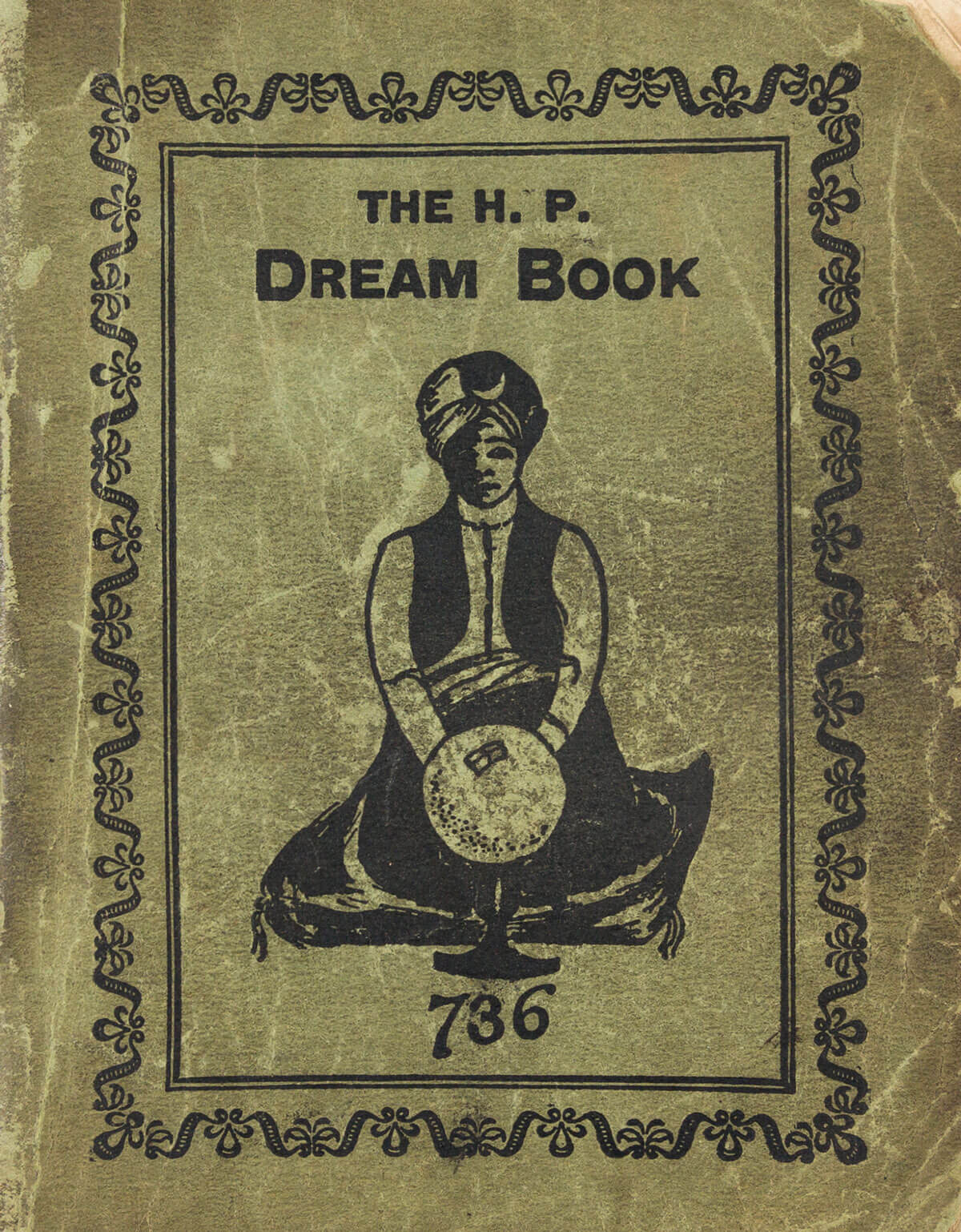 The front cover of “The H. P. Dream Book“, published in nineteen twenty-six by G. Parris Company, depicting a fakir seated before a “looking-glass” and, beneath him, the number 736. The book’s entries for “looking-glass,” “Hindoo,” “dream book,” and “Prof. Konje,” are all similarly associated with the number 736.