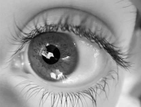 A close-up photograph of a child's eye by artist Wendy Ewald, circa 2002.