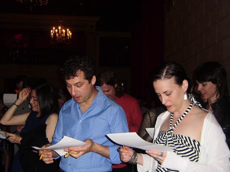 Ben Yalom and Fiona Maazel concentrating on their bingo cards.