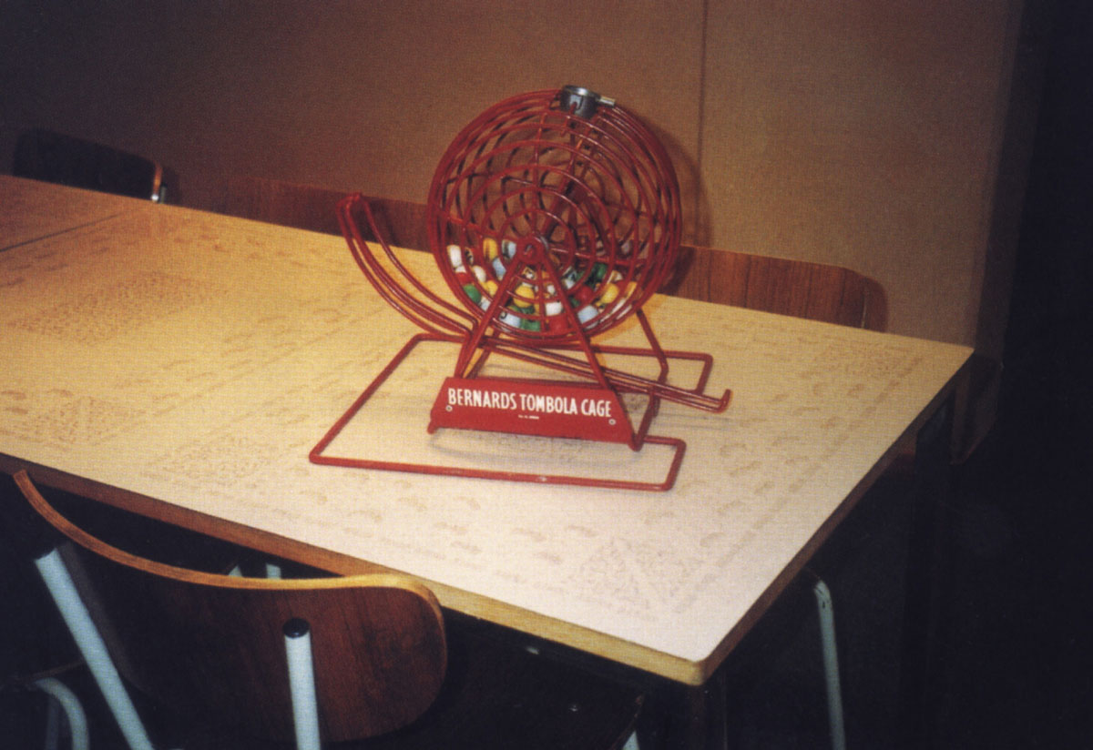 A photograph of a bingo cage on a table in the Arena Bingo Hall in Stockholm, Sweden.