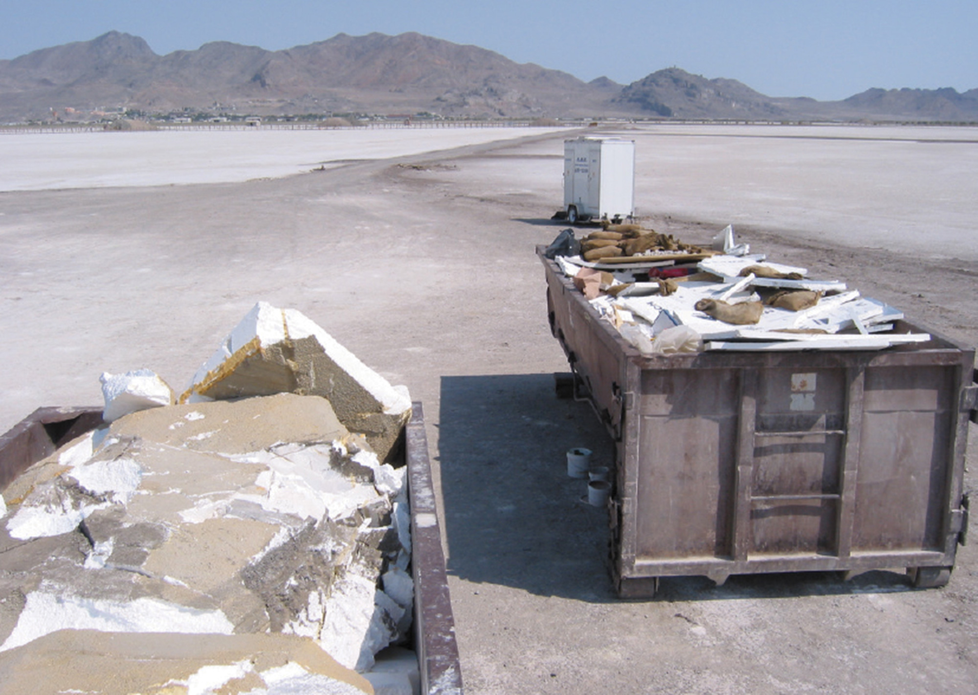 A photograph of “The Hulk” film set props in dumpsters.