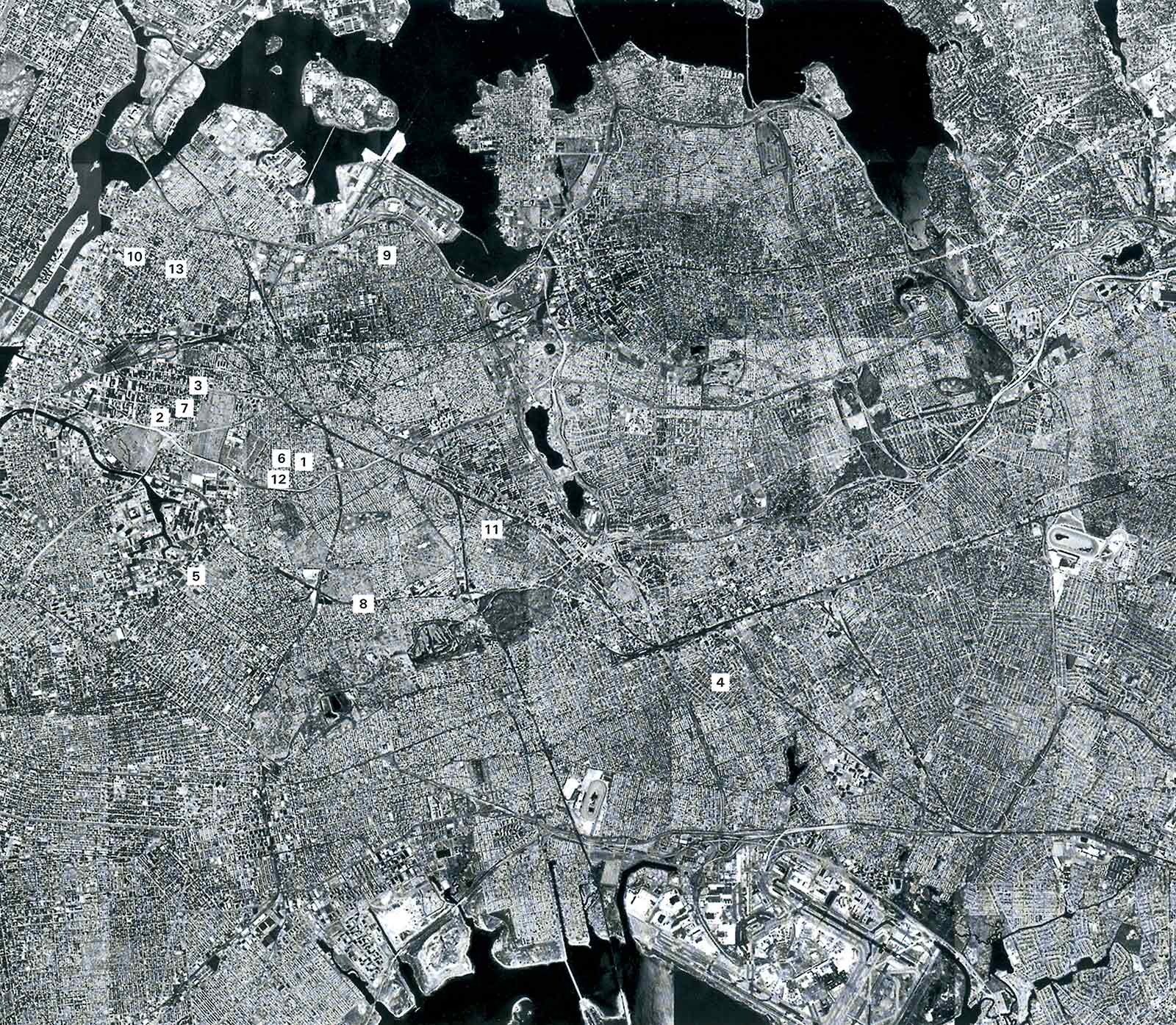 Map showing the locations of the thirteen Reality Properties: Fake Estates sites in Queens.