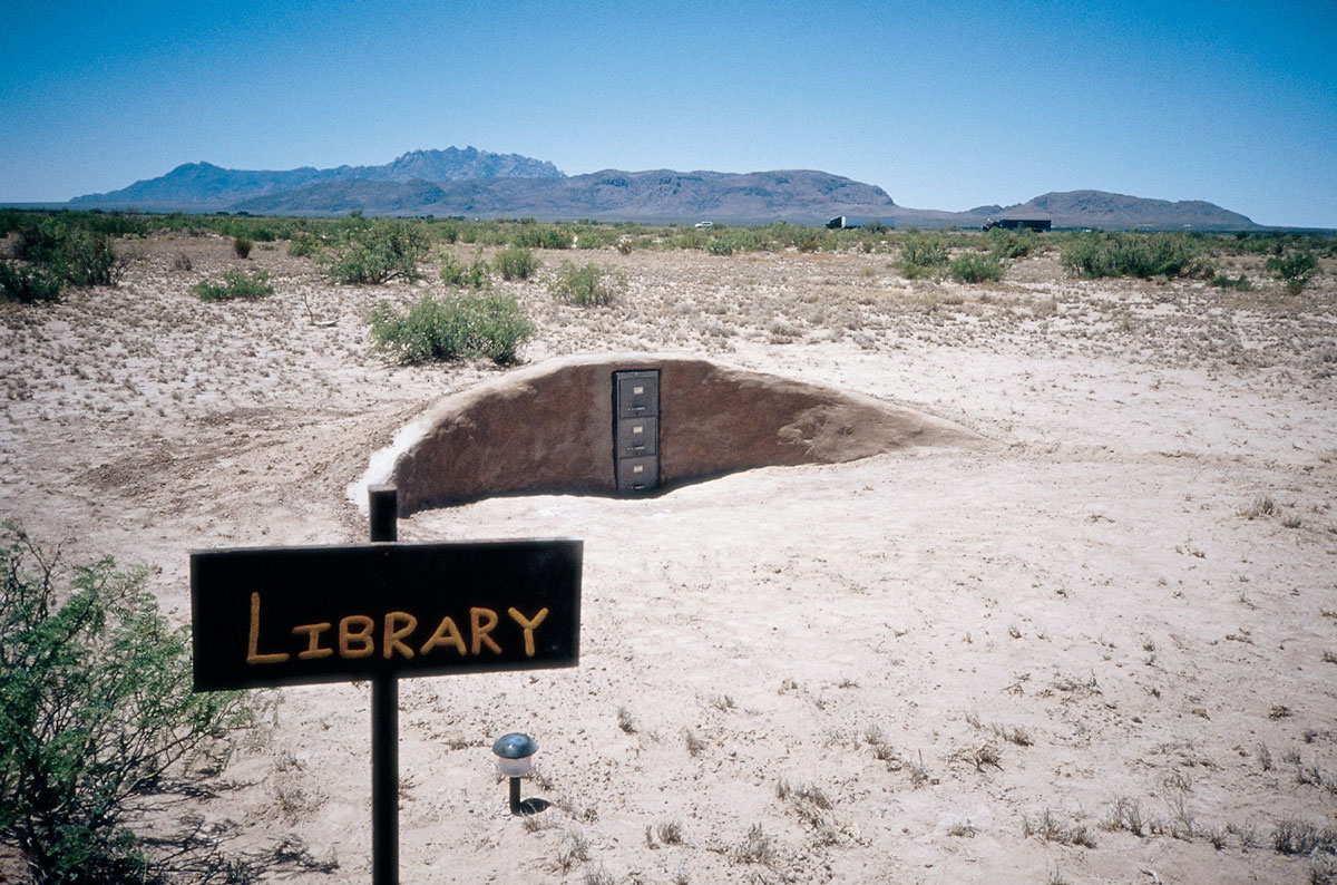 A photograph of the Cabinet National Library in the scrublands of New Mexico.