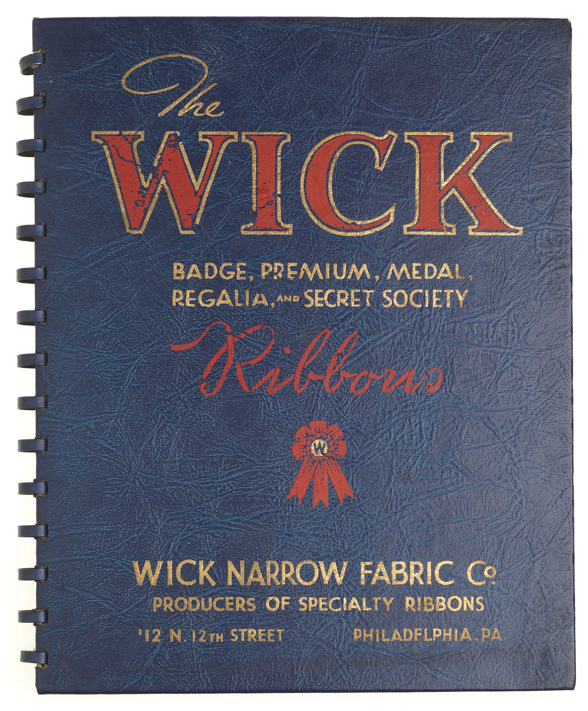 A photograph of the cover of a 1940s Wick ribbon catalogue.