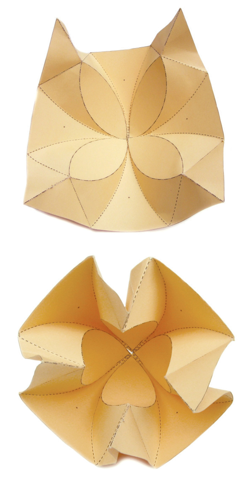 A photograph showing two steps of the folding process to make an origami bud.