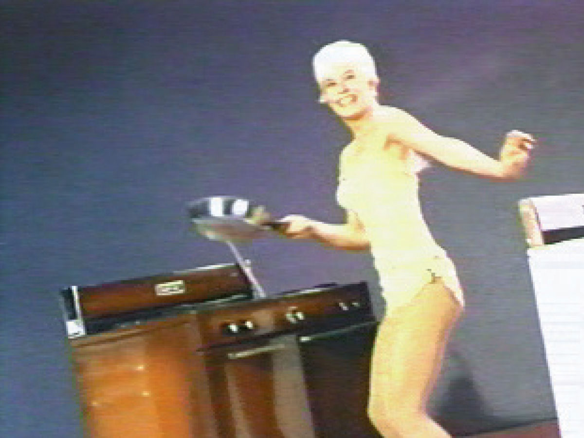 A video still from Jody Miller’s “Queen of the House.”