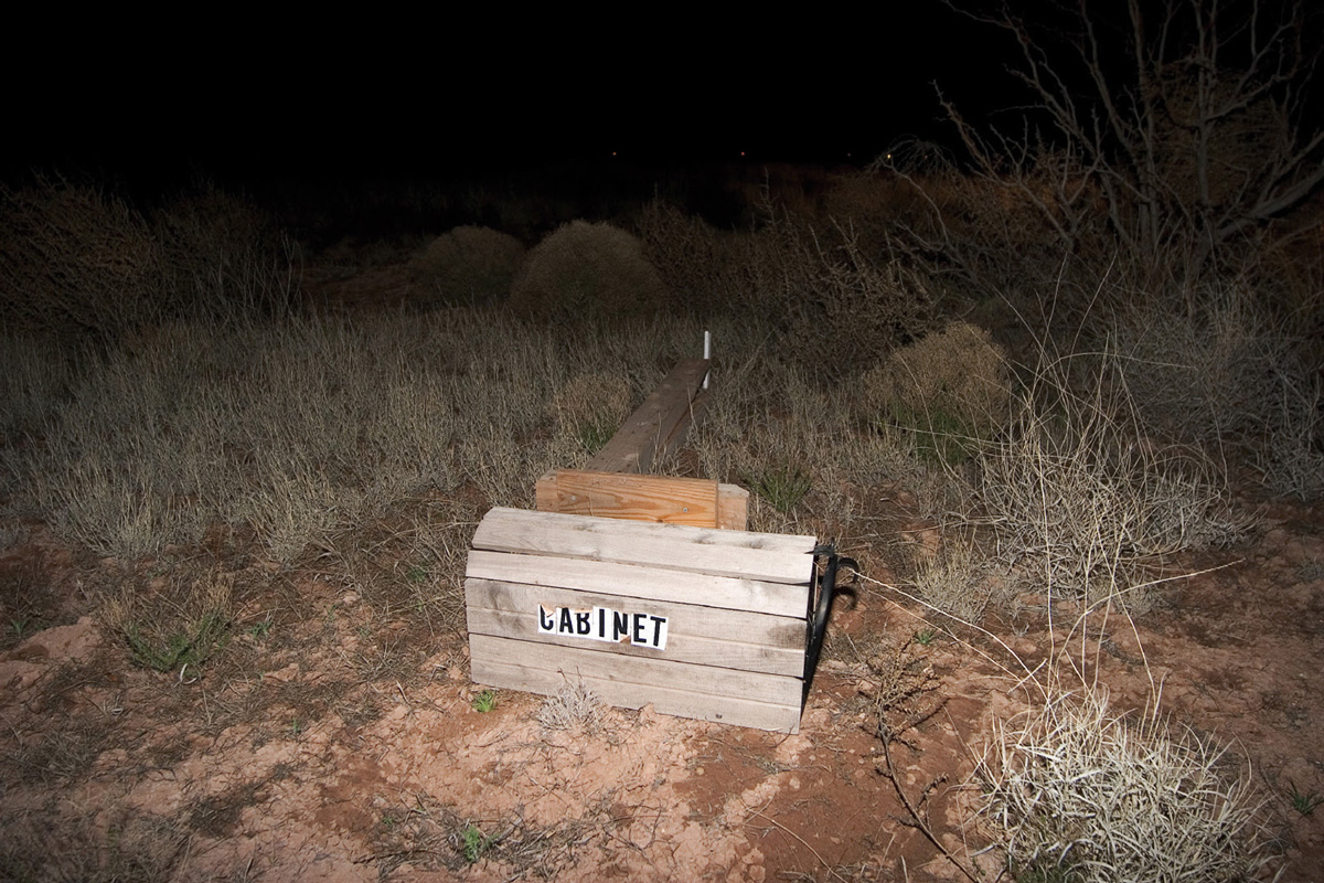 A photograph of Cabinet’s fallen mailbox at Cabinetlandia in the New Mexico desert.