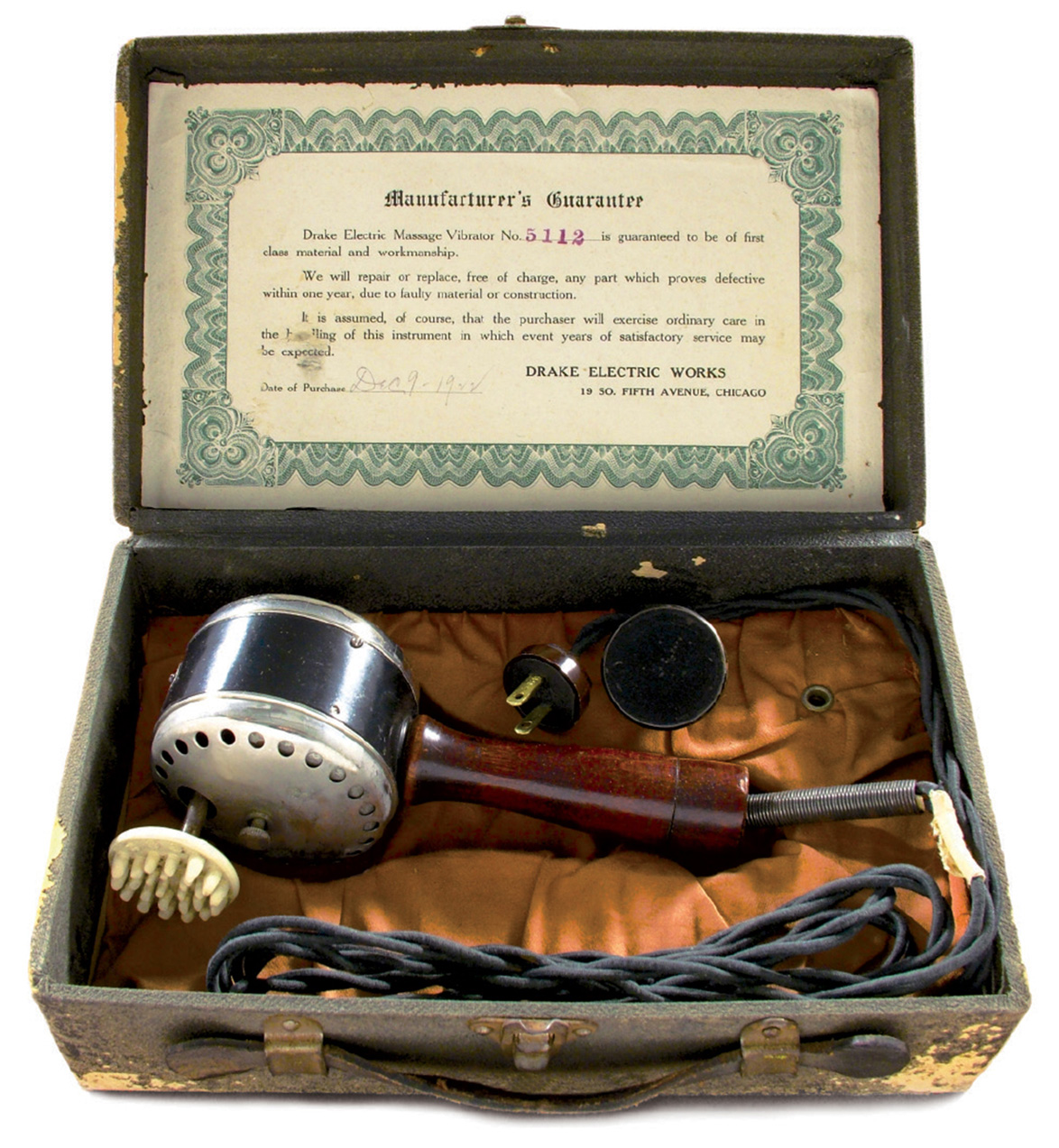 A photograph of an electric massage vibrator, manufactured by Drake Electric Works, nineteen twenty two.