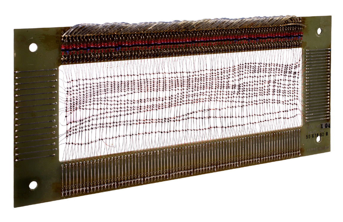 A photograph of the Ferroxcube, an eighty by sixteen-bit-word core memory plane. Core diameter one point three millimeters.