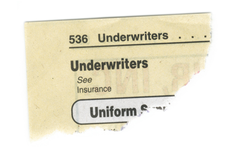 The torn corner of a Yellow Pages telephone directory: Underwriters