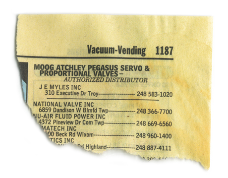 The torn corner of a Yellow Pages telephone directory: Vacuum to Vending