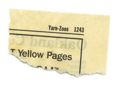 The torn corner of a Yellow Pages telephone directory: Yarn to Zoos