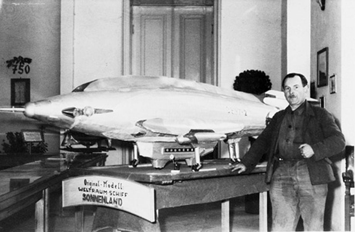 A photograph of Janke standing next to his model spaceship “Sonnenland” in the late ninteen fifties.