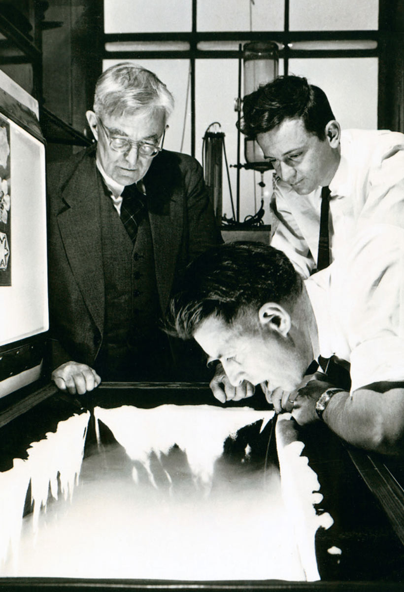 A photograph of Irving Langmuir, Vincent Schaefer, and Bernard Vonnegut at the GE labs, 1947.