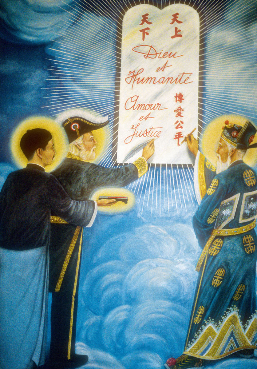 At the entry of the Cao Dai Holy See, a painting depicting three of the religion’s saints: Chinese political leader Sun Yat-sen, French author Victor Hugo, and Vietnamese poet Nguyen Binh Khiem. Photo Robert D. Fiala.