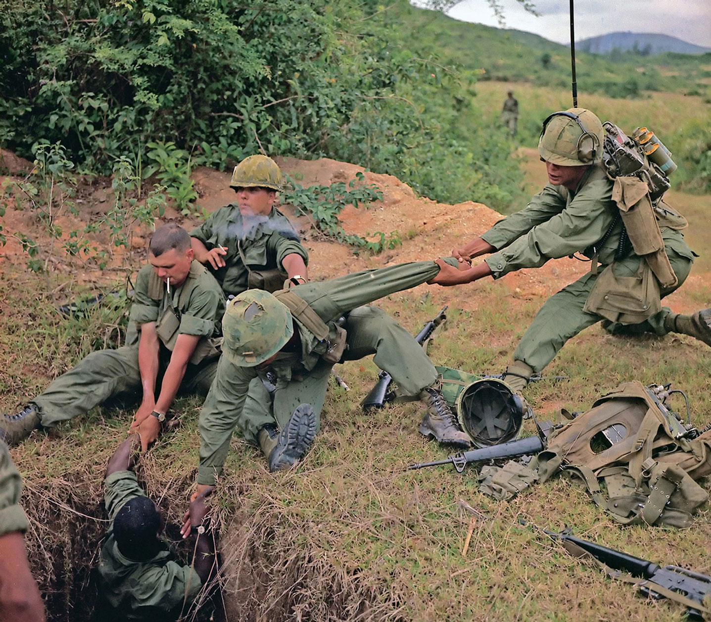 A photograph of “Tunnel rats” at work during Operation Oregon, 24th of April nineteen sixty-seven. 