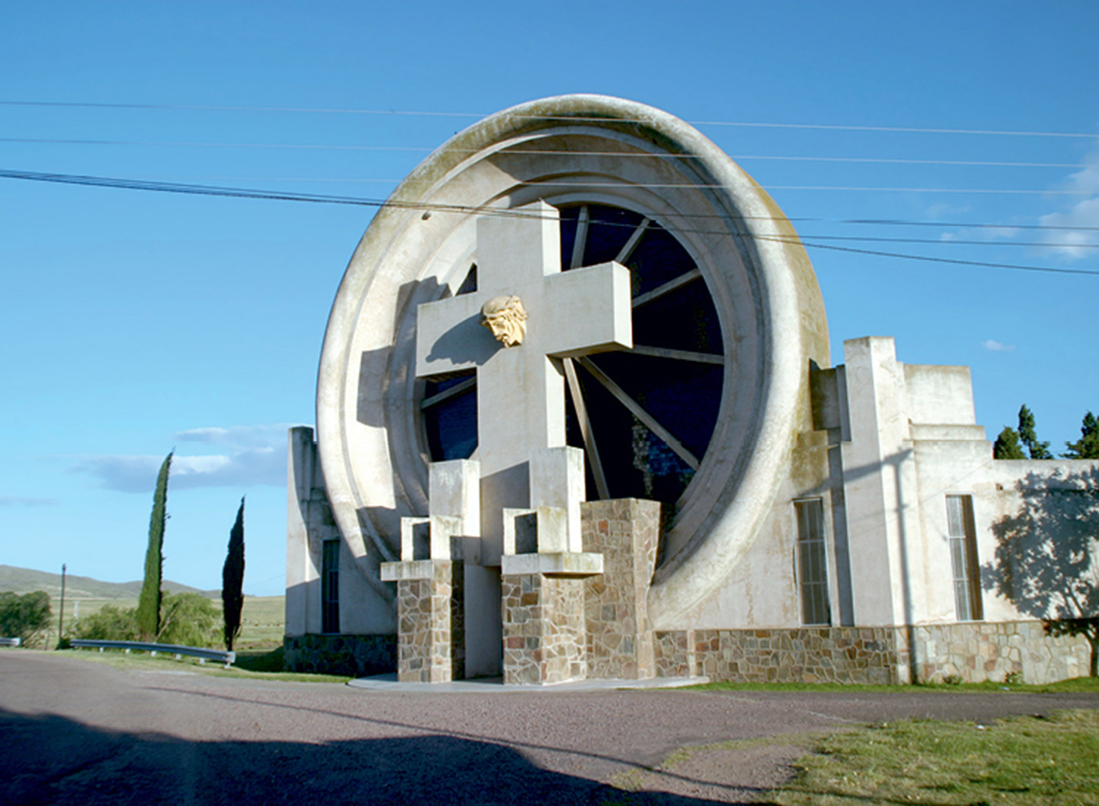 A photograph of a cemetery portal designed by architect Francisco Salamone in Saldungaray, Argentina. 