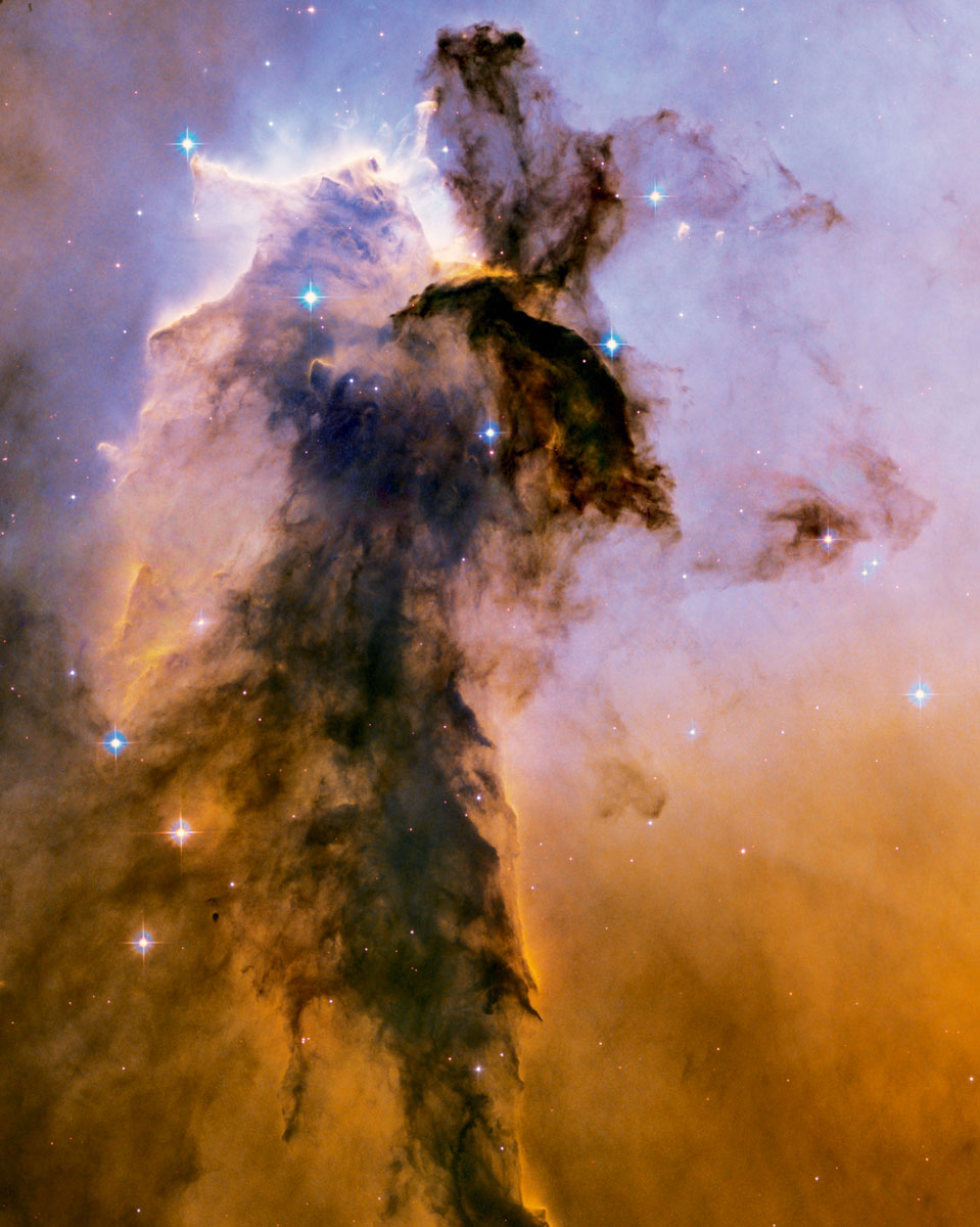 A 2006 Hubble Space Telescope photograph of the Eagle Nebula, showing pillars of star-forming gas and dust.