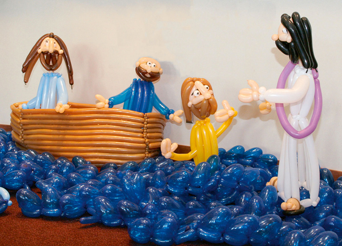 A photograph of Ralph Dewey’s rendition of Jesus walking on water made with balloons.