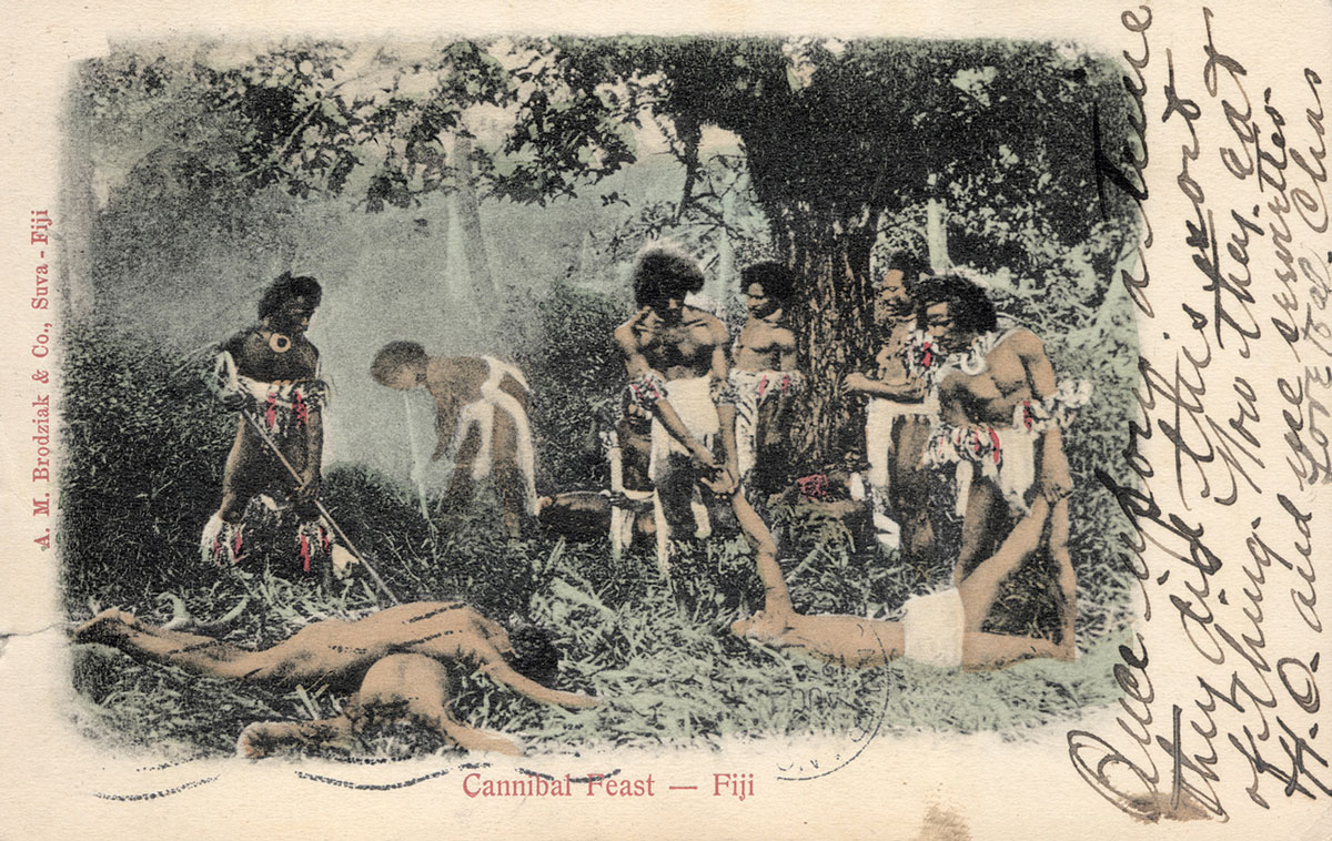 A nineteen oh seven postcard titled “Cannibal Feast—Fiji” depicting a group of men preparing three dead bodies.