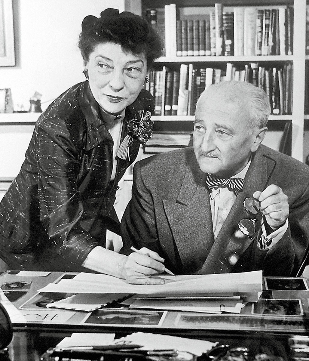 Nineteen fifty-seven photograph of William and Elizebeth Friedman in the study of their Capitol Hill home.