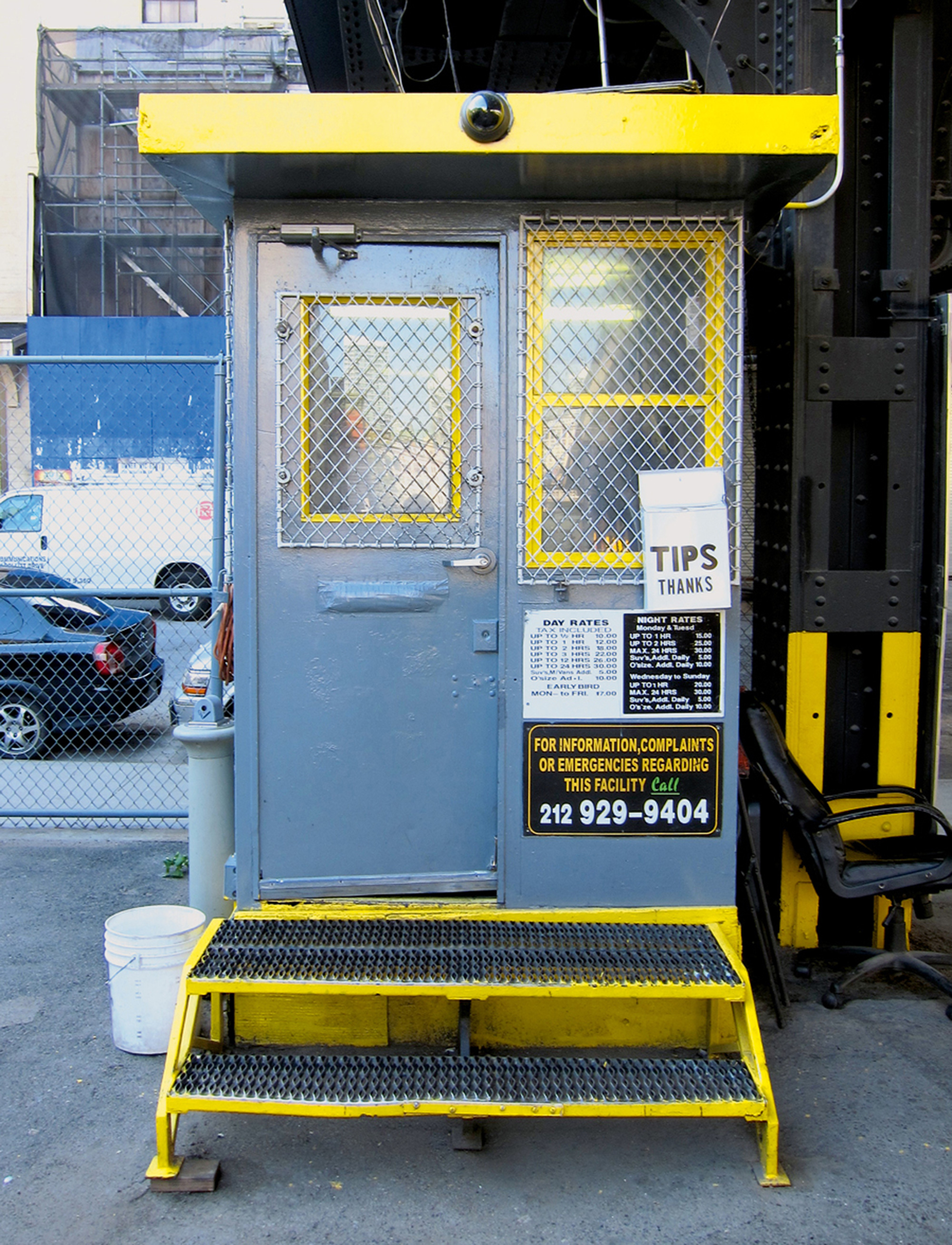A photograph of a valet booth on sixth Street, between ninth and tenth Avenues, in New York City.