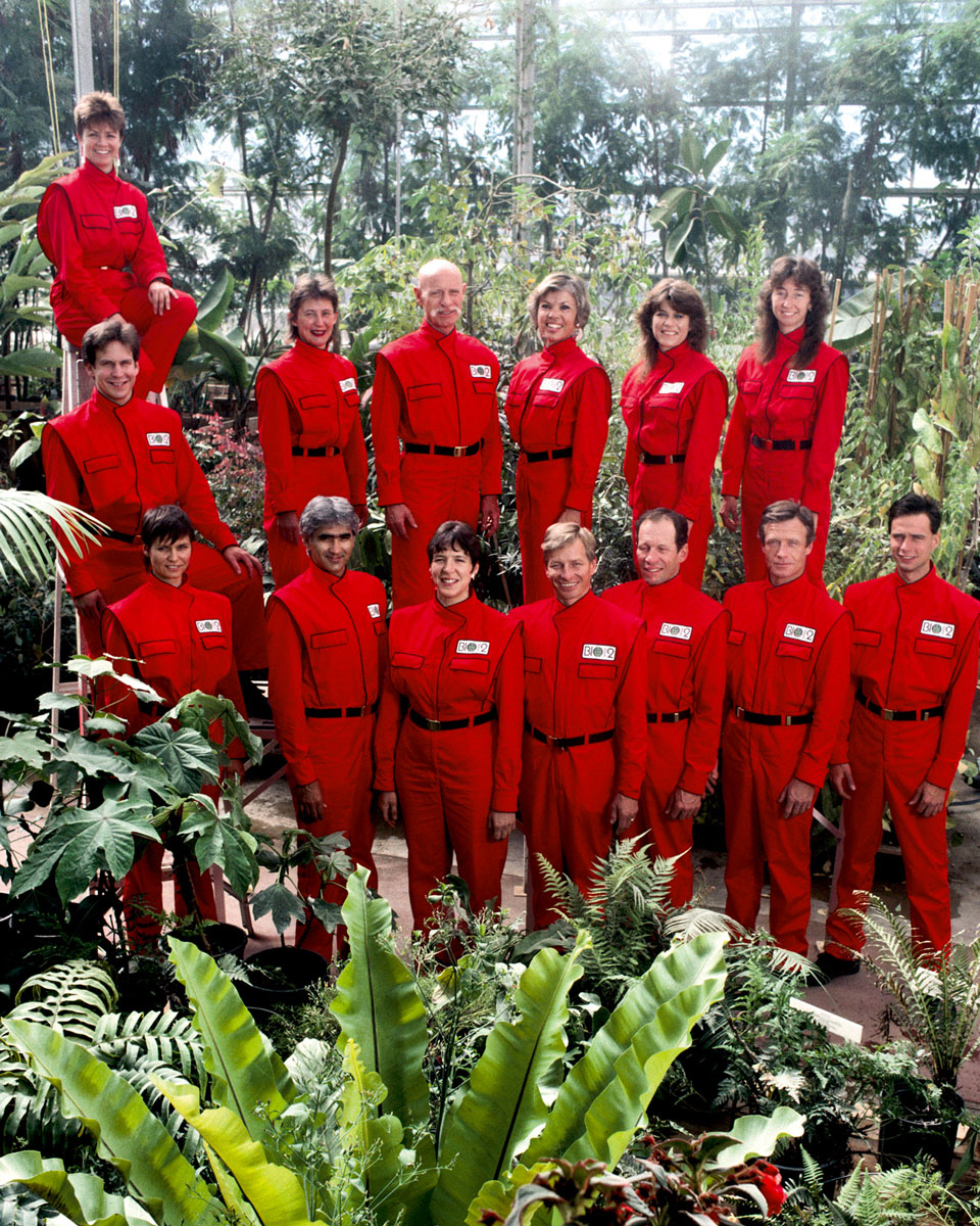 Group photo of candidates for Biosphere 2, 1989. Only six of the fourteen individuals shown were ultimately chosen to live in the biosphere, along with two others not present. A trim Roy Walford is in the back row sporting a moustache.