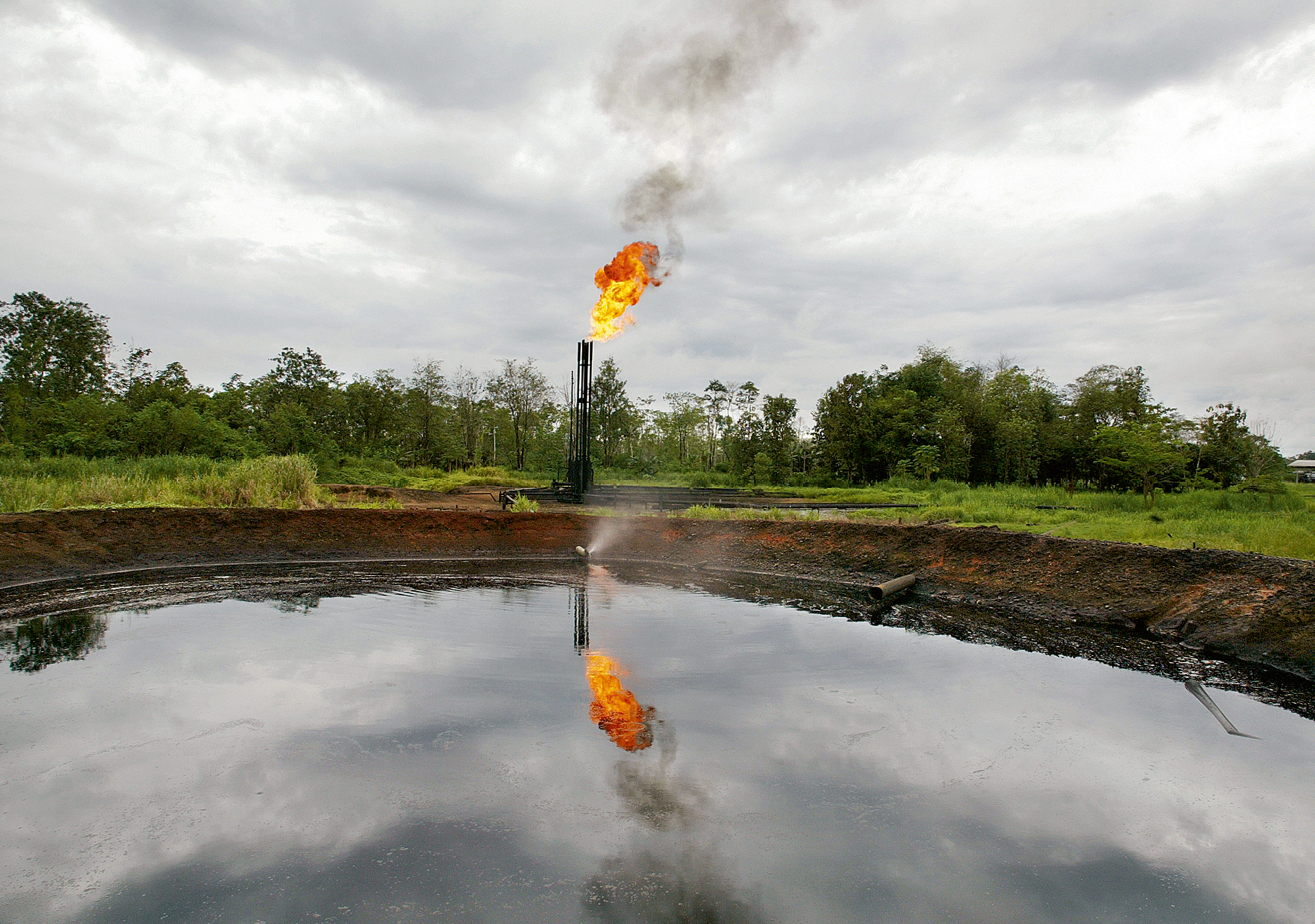 Lou Dematteis’s photograph of Gas being burned off at a separation station built by Texaco outside the town of Shushufindi in the Ecuadoran Amazon. 