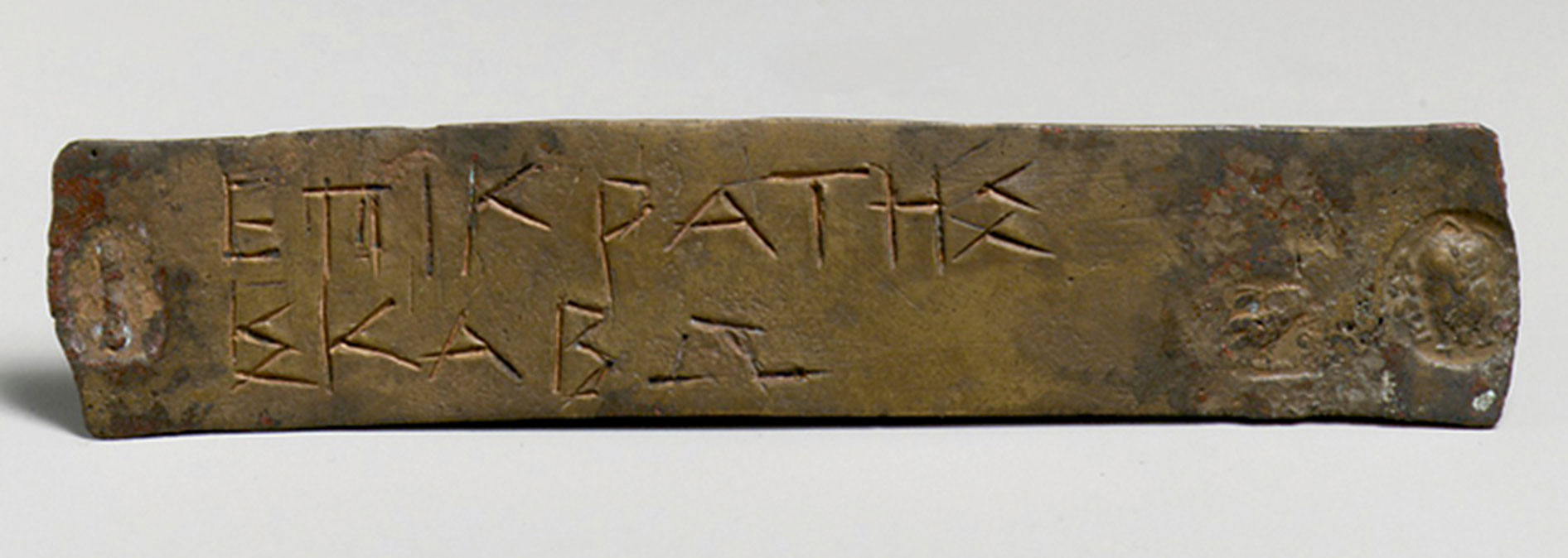 A juror’s identification ticket from fourth-century bee see Athens. Each Athenian citizen on jury duty for a given year was issued a bronze plaque carrying an official stamp and his name. On the day of a trial, the prospective jurors appeared before a magistrate in charge of selecting the jury and their plaques were placed in rows in a device used to ensure random selection.