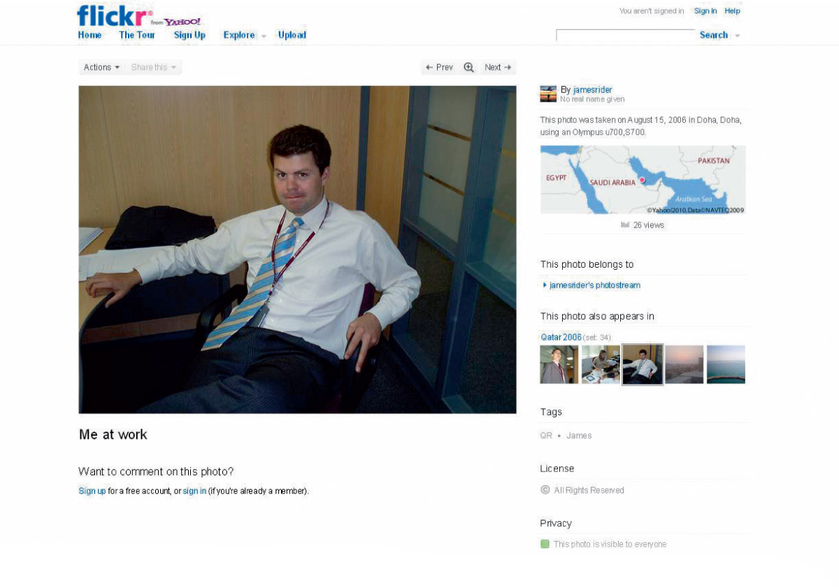 A screenshot of a photograph on Flickr showing a man at work in an office. 