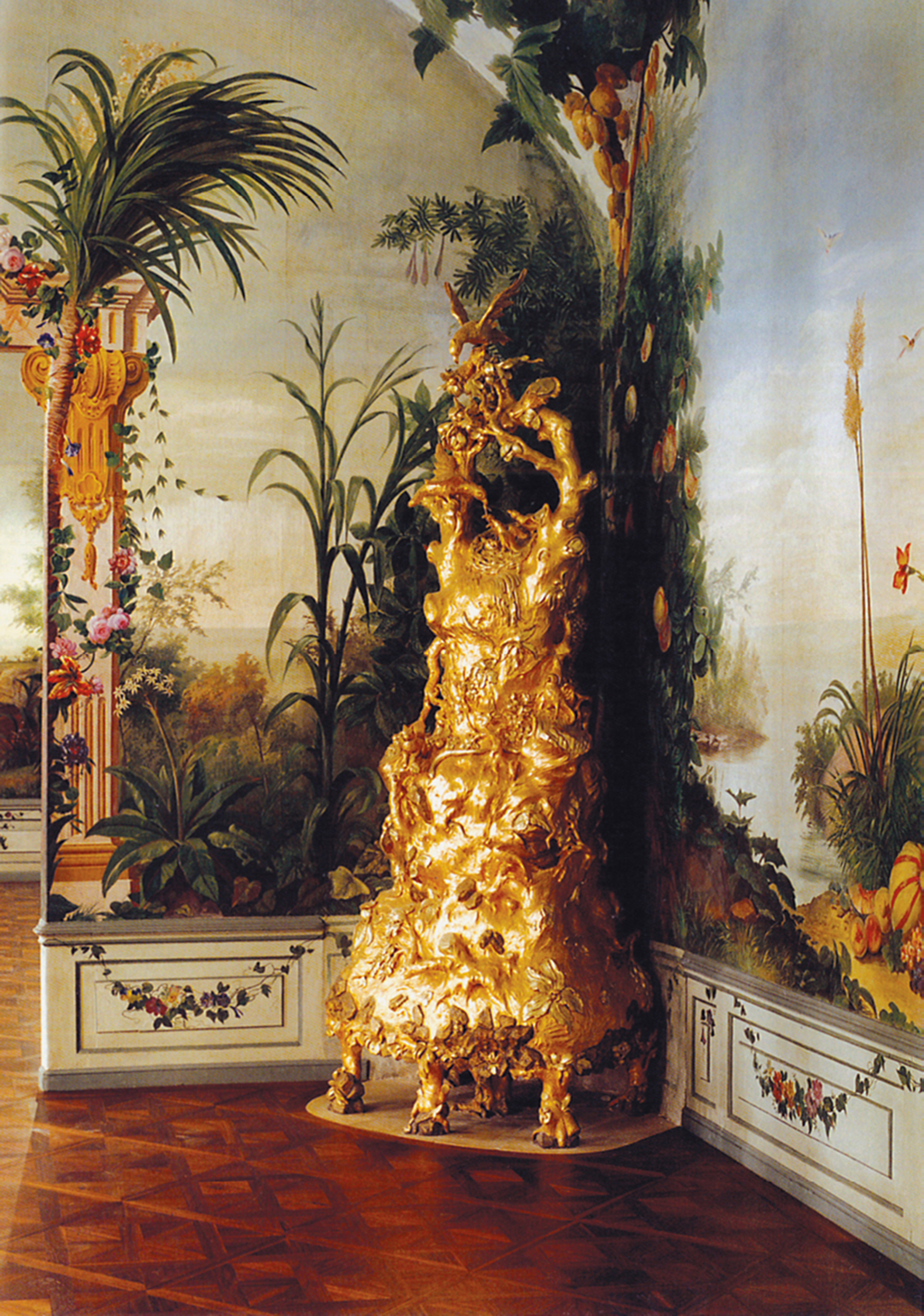 A photograph of a gilded faience stove in the shape of a tree, designed in seventeen sixty-nine by Johann Wenzel Bergl for Schönbrunn Palace, Vienna.