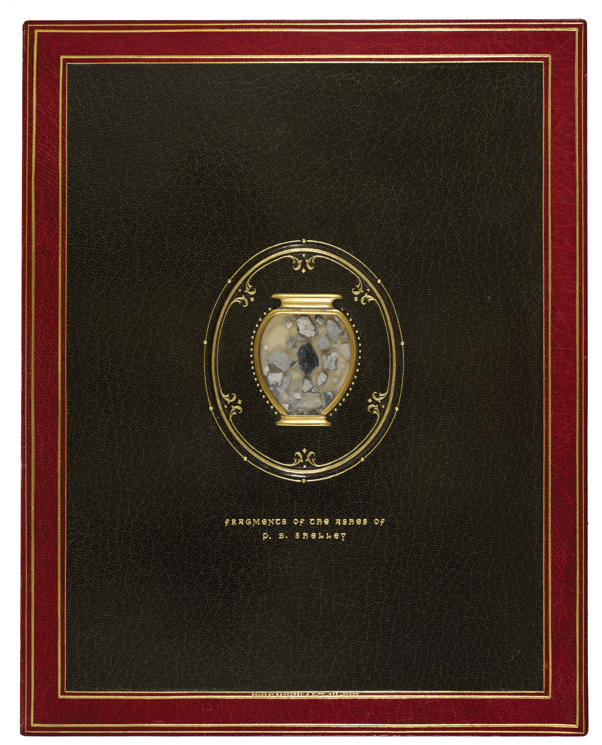 A photograph of the inside back cover of Thomas Wise’s reliquary book purportedly containing a small amount of Shelley’s ashes and fragments of his skull.