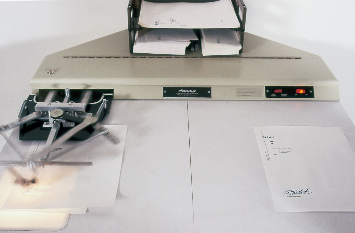 A photograph of a signature machine used in artist Christoph Büchel’s 1999 project “Blank.”