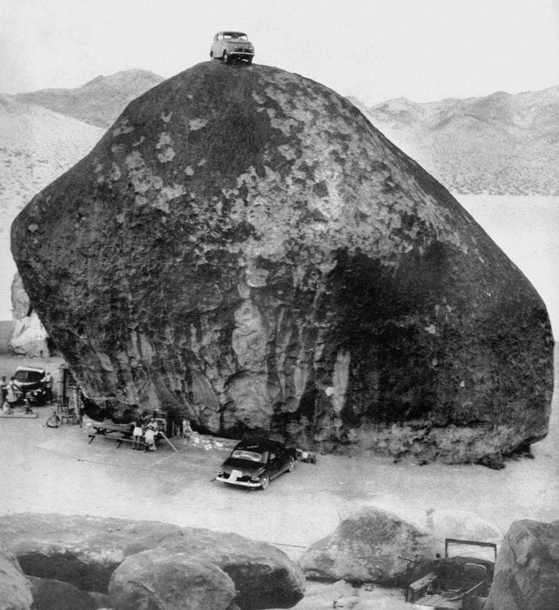 A photograph of Van Tassel’s boulder, crowned with a car hoisted using a windlass and cable, featured as a “Picture of the Week” in the 15th of October nineteen fifty-one issue of “Life.” 