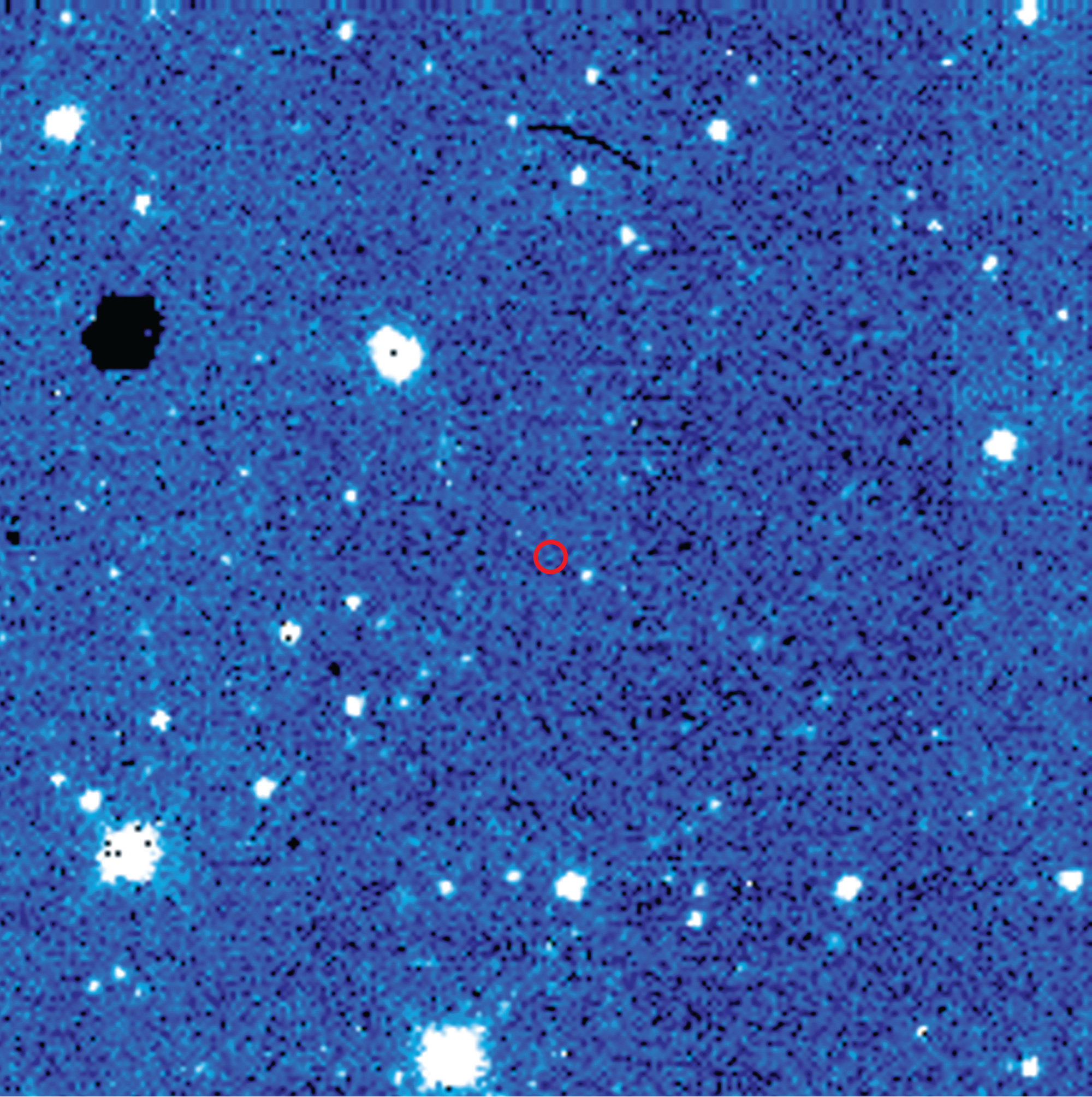 An infrared image of an asteroid belt taken on the 14th of January two thousand and ten, with “13585 Justinsmith” identified by a red circle. 