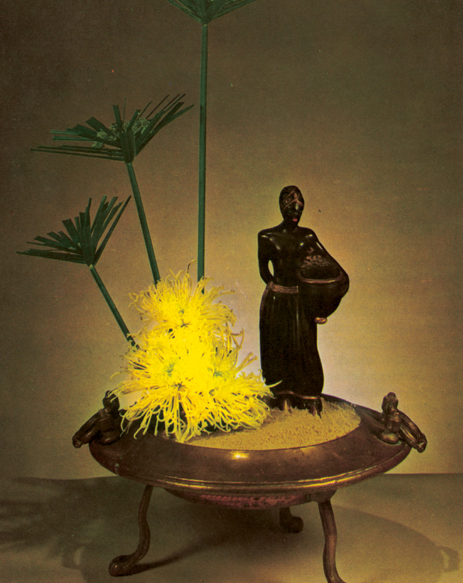 A photograph of a flower arrangement by Mrs. Andrew J. Combs entitled “Eastern Culture,” one of the winners from the California Garden Clubs, Inc. Flower Show, 1960s.