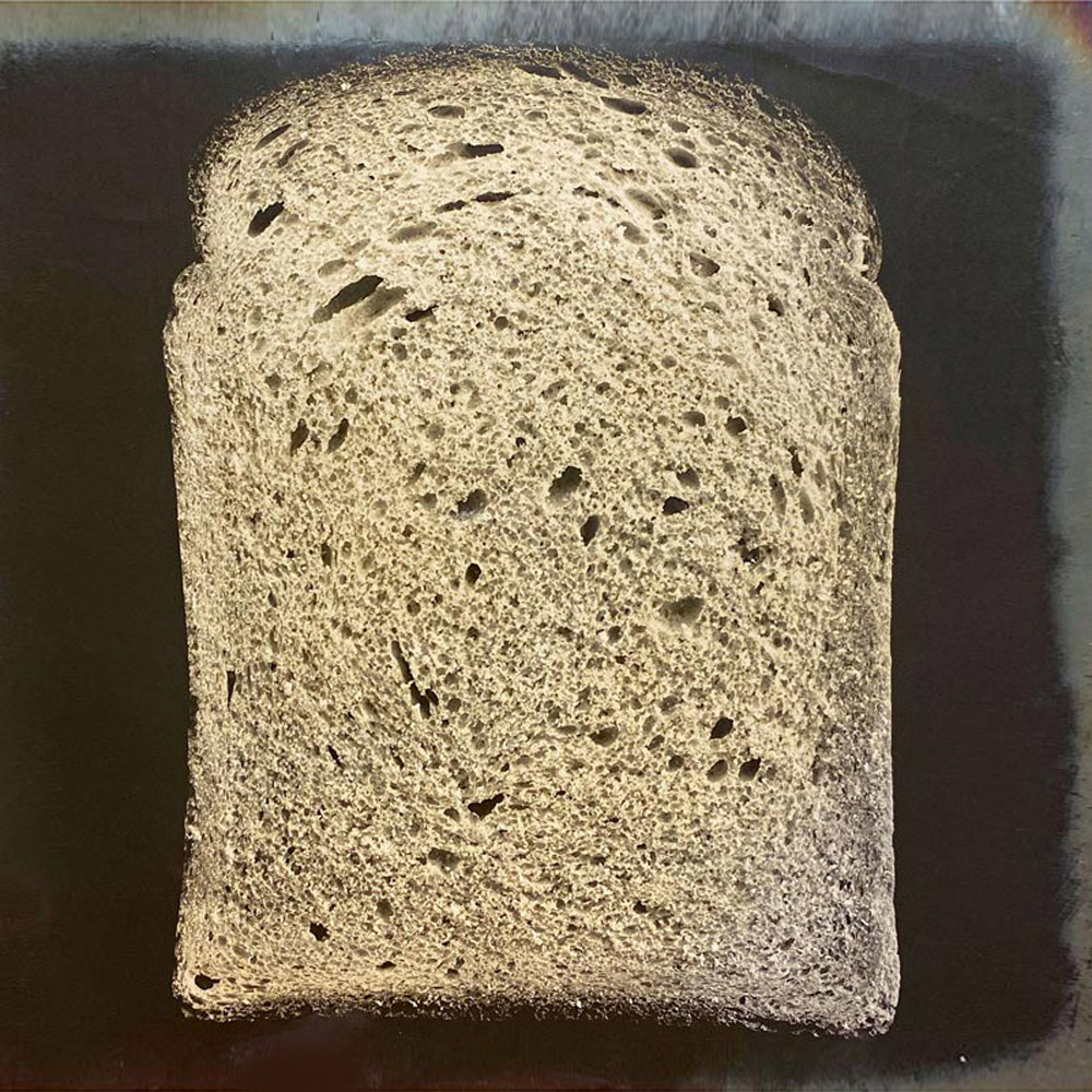 A photograph from Owen Simmons’s “The Book of Bread” depicting, according to the original caption, a section of “a two-pound loaf from south Wales.”